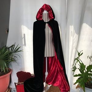 Black velvet and red satin cape